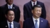 Japan's Prime Minister Fumio Kishida and Chinese President Xi Jinping pose for a family photo during Asia-Pacific Economic Cooperation (APEC) CEO Summit in San Francisco, California, U.S. November 16, 2023. REUTERS/Carlos Barria