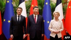 China's President Xi Jinping, his French counterpart Emmanuel Macron and European Commission President Ursula von de Leyen meet in Beijing, Apr. 6, 2023. (Photo by Ludovic Marin/ Pool / AFP)