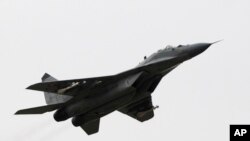 FILE - A view of a MiG-29 aircraft at Sliac Air Base, in Sliac, Slovakia, Feb. 29, 2008. 