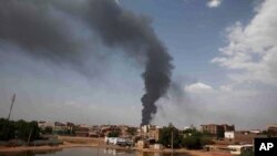 FILE - Smoke rises over Khartoum, Sudan, June 8, 2023, as fighting between the Sudanese army and paramilitary Rapid Support Forces continues. A 24-hour cease-fire was to begin June 10.