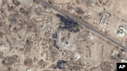 This Jan. 12, 2024, satellite image provided by Maxar Technologies shows damage from airstrikes on a radar site at Sanaa Airport in Yemen. 