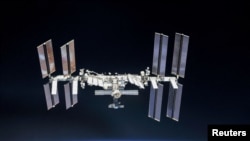 ISS photographed by Expedition 56 crew members from a Soyuz spacecraft after undocking