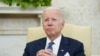 U.S. President Joe Biden listens during his meeting with Mexican President Andres Manuel Lopez Obrador in the Oval Office of the White House in Washington, July 12, 2022.