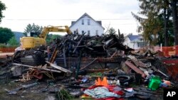 A house that was destroyed by a fatal fire is seen in Nescopeck, Pa., Aug. 5, 2022. 