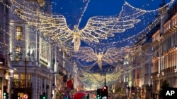 Christmas lights are displayed on Regent Street, in London, Nov. 24, 2022. 