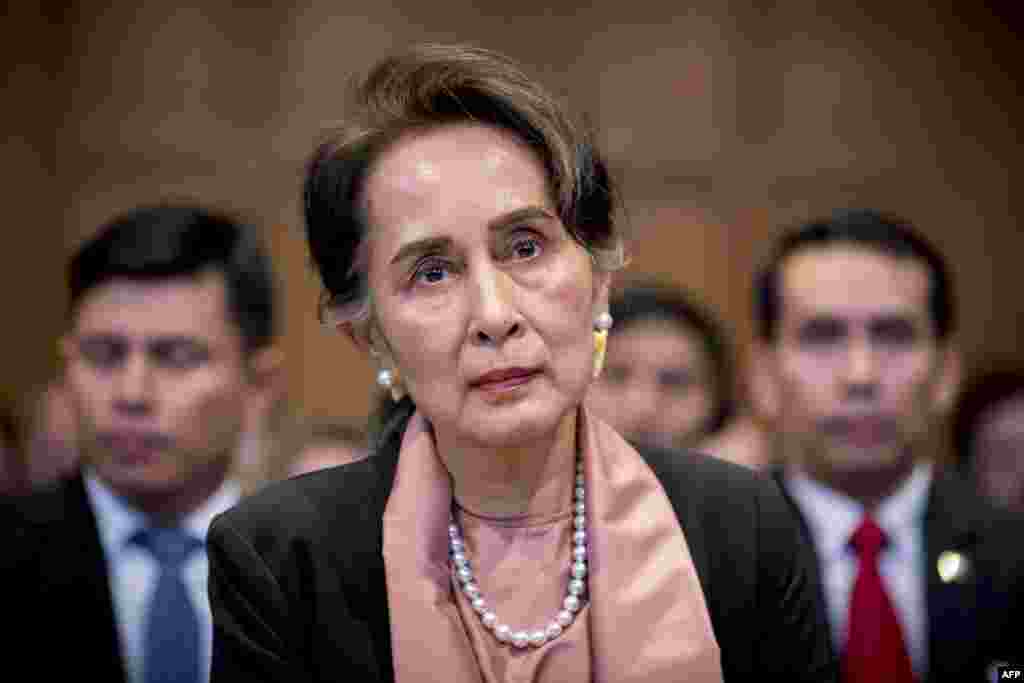 A handout photo released on December 10, 2019 by the International Court of Justice shows Myanmar&#39;s State Counsellor Aung San Suu Kyi attending the start of a three-day hearing on the Rohingya genocide case before the UN International Court of Justice at 