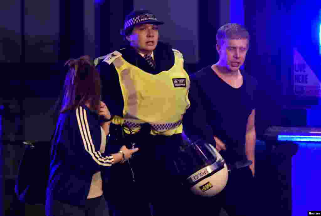 Police attend to an incident on London Bridge in London, Britain, June 3, 2017. 