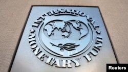 International Monetary Fund logo is seen outside the headquarters building 