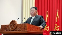 FILE PHOTO: North Korea's leader Kim Jong Un visits the Central Officers School in Pyongyang