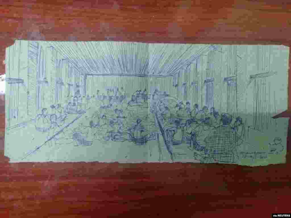 MYANMAR-POLITICS/PRISON -A smuggled sketch shows people inside of Myanmar&#39;s Insein prison with a written date April 17, 2021, in this undated picture obtained by REUTERS