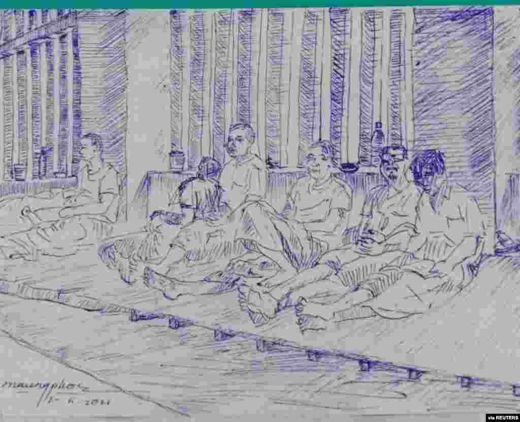 MYANMAR-POLITICS/PRISON -A smuggled sketch shows people inside of Myanmar&#39;s Insein prison with a written date April 17, 2021, in this undated picture obtained by REUTERS