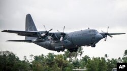  C-130 Hercules အမျိုးအစား စစ်ရေးဆိုင်ရာ သယ်ယူပို့ဆောင်ရေးလေယာဉ်။ (ယခင်ပုံဟောင်း)