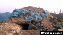 A Government soldier fighting with MNDAA kokang army