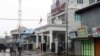 A bank office and shops are closed in Sittwe, capital of Rakhine state in western Myanmar, on Friday, June 15, 2012. The communal violence that swept through Rakhine over the past week killed dozens of people. (AP Photo/Khin Maung Win)