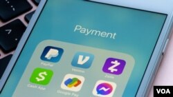 Portland, OR, USA - Feb 9, 2021: Assorted apps for payment are seen on an iPhone - PayPal, Venmo, Zelle, Cash App, Google Pay, and Facebook Messenger.