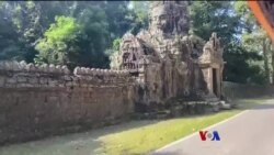 Ta Prohm ကျောင်းတော်နဲ့ Siem Reap နေဝင်ချိန်