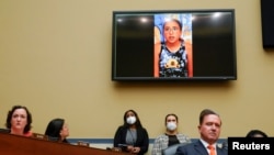 Miah Cerrillo, a student at Robb Elementary School in Uvalde, Texas, and survivor of a mass shooting appears on a screen during a House Committee on Oversight and Reform hearing on gun violence on Capitol Hill in Washington, June 8, 2022.