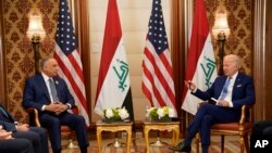 President Joe Biden meets with Iraqi Prime Minister Mustafa Al-Kadhimi, Saturday, July 16, 2022, in Jeddah, Saudi Arabia. (AP Photo/Evan Vucci)