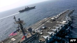 အမေရိကန် လေယာဉ်တင်သင်္ဘော USS Abraham Lincoln (ယခင်ပုံဟောင်း)