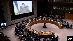 Ukrainian President Volodymyr Zelenskyy speaks via remote feed during a meeting of the UN Security Council, April 5, 2022, at United Nations headquarters in New York. 