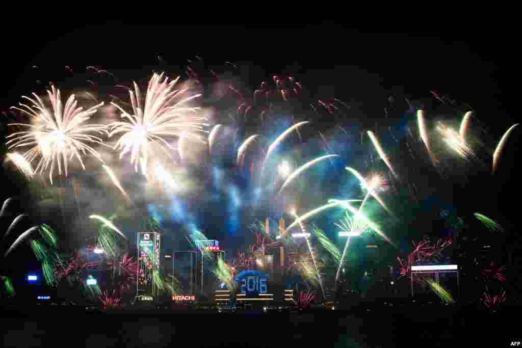 Fireworks are seen over the city&#39;s skyline in Hong Kong on January 1, 2016