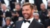 Foto Achiv: Ricky Martin poze pou yon foto nan festival entenasyonal sinema Cannes nan, nan sid peyi La Frans, 25 Me 2022. 