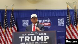 Former U.S. President and Republican presidential candidate Donald Trump campaigns, in Indianola