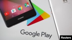 Huawei smartphones are seen in front of displayed Google Play logo in this illustration picture, May 20, 2019.