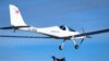 Swiss adventurer Raphael Domjan jumps from the SolarStratos solar-powered aircraft prototype with Spanish test pilot Miguel Iturmendi aboard, at the airbase in Payerne, Switzerland, Aug. 25, 2020. 