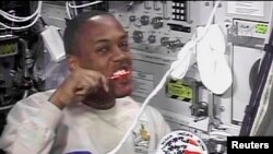 Astronaut brushing teeth