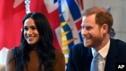 ဇနီးဖြစ်သူ Meghan နှင့် ဗြိတိန် တော်ဝင် မင်းသား Harry 