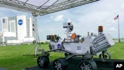 A replica of the Mars rover Perseverance is displayed outside the press site at the Kennedy Space Center, July 29, 2020, in Cape Canaveral, Fla.