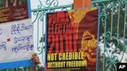 Protesters say elections held by military regime are unfair, outside a public park in Mae Sot, Thailand, 07 Nov 2010