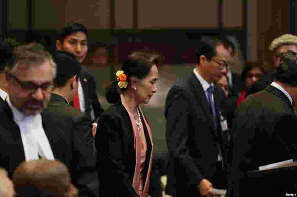 Myanmar&#39;s leader Aung San Suu Kyi arrives at the International Court of Justice (ICJ), ahead of hearings in a case filed by Gambia against Myanmar alleging genocide against the minority Muslim Rohingya population, in The Hague, Netherlands December 10, 20