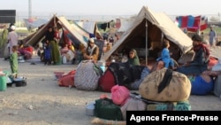 Afghan refugees rest in tents at a makeshift shelter camp in Chaman, a Pakistani town on the border with Afghanistan, on Aug. 31, 2021.