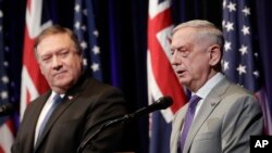 U.S. Secretary of Defense Jim Mattis, right, speaks next to U.S. Secretary of State Mike Pompeo at the 2018 Australia-U.S. Ministerial Consultations in Stanford, Calif., July 24, 2018. The two secretaries travel to India for "2 plus 2" dialogue Thursday.