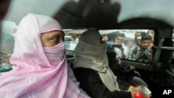 Relatives of Mir Quasem Ali, senior leader of the country's largest Islamic party Jamaat-e-Islami, arrive to meet Ali at the Kashimpur Central Jail in Gazipur, on the outskirts of Dhaka, Bangladesh, Saturday, Sept. 3, 2016.