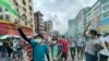 A flash mob protest in Yangon, Myanmar, Sunday, July 11, 2021. (AP Photo)