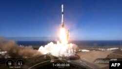 This screen grab taken from a SpaceX video shows the Falcon 9 launch of the Korea 425 Mission at Vandenberg Air Force Base in California on December 1, 2023.