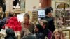 Macy's aisles are crowded with shoppers on Black Friday - called that because the surge of shoppers could take retailers into profitability, Manhattan, New York.