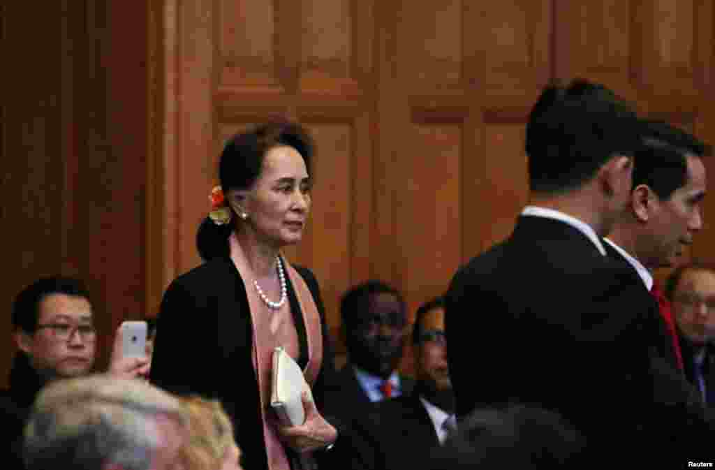 Myanmar&#39;s leader Aung San Suu Kyi arrives at the International Court of Justice (ICJ), ahead of hearings in a case filed by Gambia against Myanmar alleging genocide against the minority Muslim Rohingya population, in The Hague, Netherlands December 10, 20