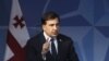 Georgia's President Mikheil Saakashvili holds a news conference after his meeting with NATO Secretary General Anders Fogh Rasmussen (unseen) at the Alliance headquarters in Brussels April 3, 2012