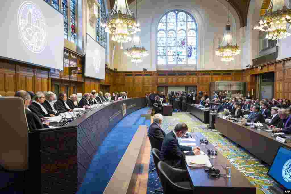 A handout photo released on December 10, 2019 by the International Court of Justice shows a general view of The International Court of Justice (ICJ) holding a public hearing on Decembre 10, 2019 in the case concerning the Application of the Convention on 