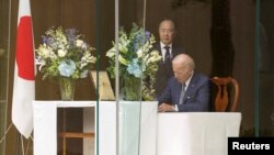 U.S. President Biden pays tribute to Japan's former Prime Minister Shinzo Abe during visit to the Japan ambassador's residence in Washington