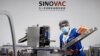 A man works in the packaging facility of Chinese vaccine maker Sinovac Biotech, developing an experimental coronavirus disease (COVID-19) vaccine, in Beijing, China, Sept. 24, 2020.