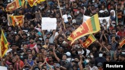 Demonstrators protest at the Presidential Secretariat, after President Gotabaya Rajapaksa fled, in Colombo