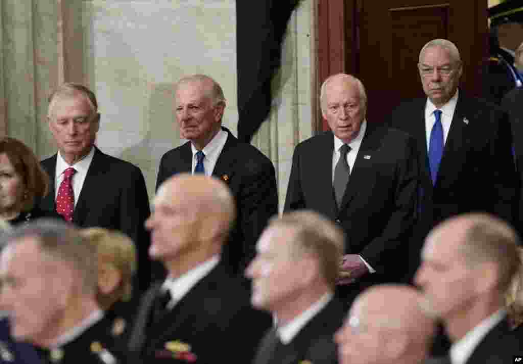 From left, former Vice President Dan Quayle, former Secretary of State James Baker III, former Vice President Dick Cheney, and former Secretary of State Colin Powell, arrive at the Capitol Rotunda in Washington, to attend a memorial service for former President George H.W. Bush, Dec. 3, 2018.