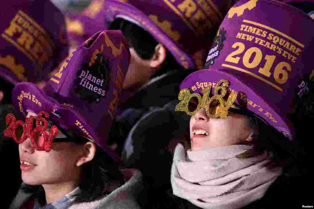 Novelty fashions are part of the fun at the New Year's celebrations in Times Square in the Manhattan borough of New York, Dec. 31, 2015.