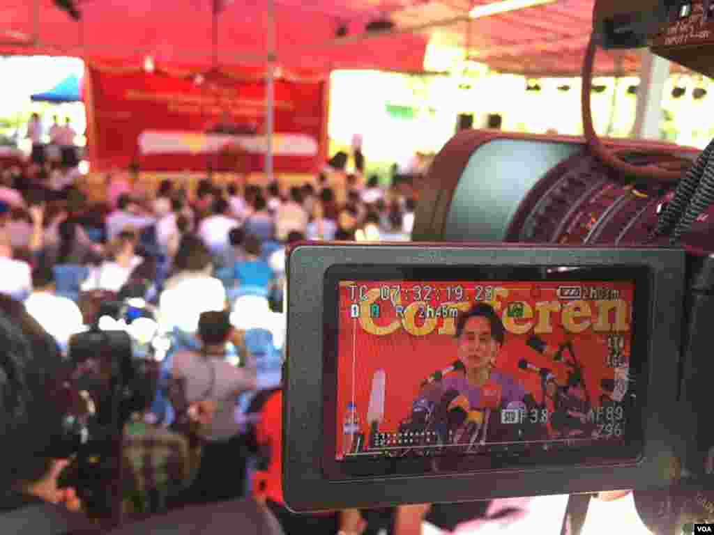 Myanmar's opposition leader Aung San Suu Kyi addresses the media at a press conference at her home in Yangon, Myanmar, Thursday, Nov. 5, 2015. Photo by Sithu