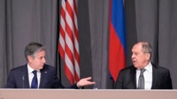 U.S. Secretary of State Antony Blinken, left, and Russian Foreign Minister Sergei Lavrov meet on the sidelines of the Organization for Security and Cooperation in Europe conference in Stockholm, Sweden, Dec. 2, 2021.